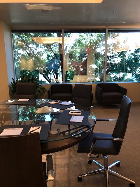 a glass table in a Las Vegas board room