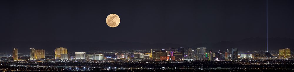 full moon over the Las Vegas skyline at night